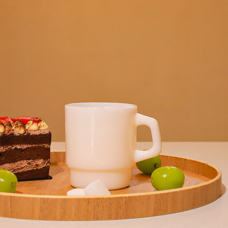 white mug lifestyle photo with food styling, branded promotional product