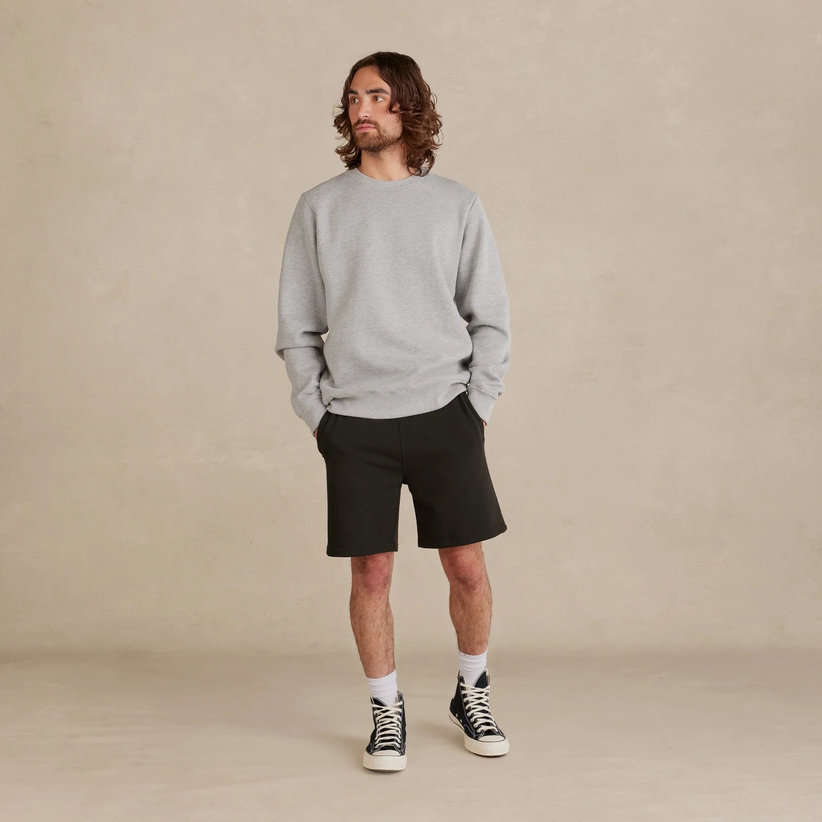 EMERCYN Essential Crewneck – slate Grey unisex premium cotton sweatshirt worn by model