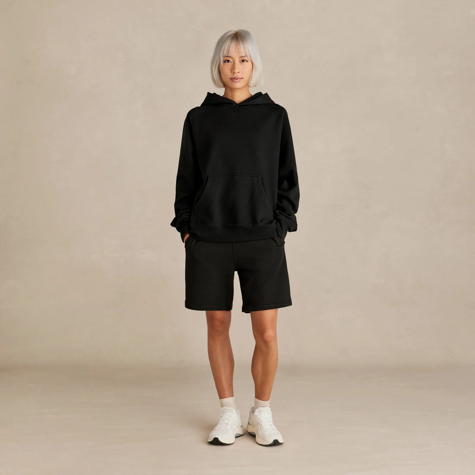 Unisex black oversized hoodie on model