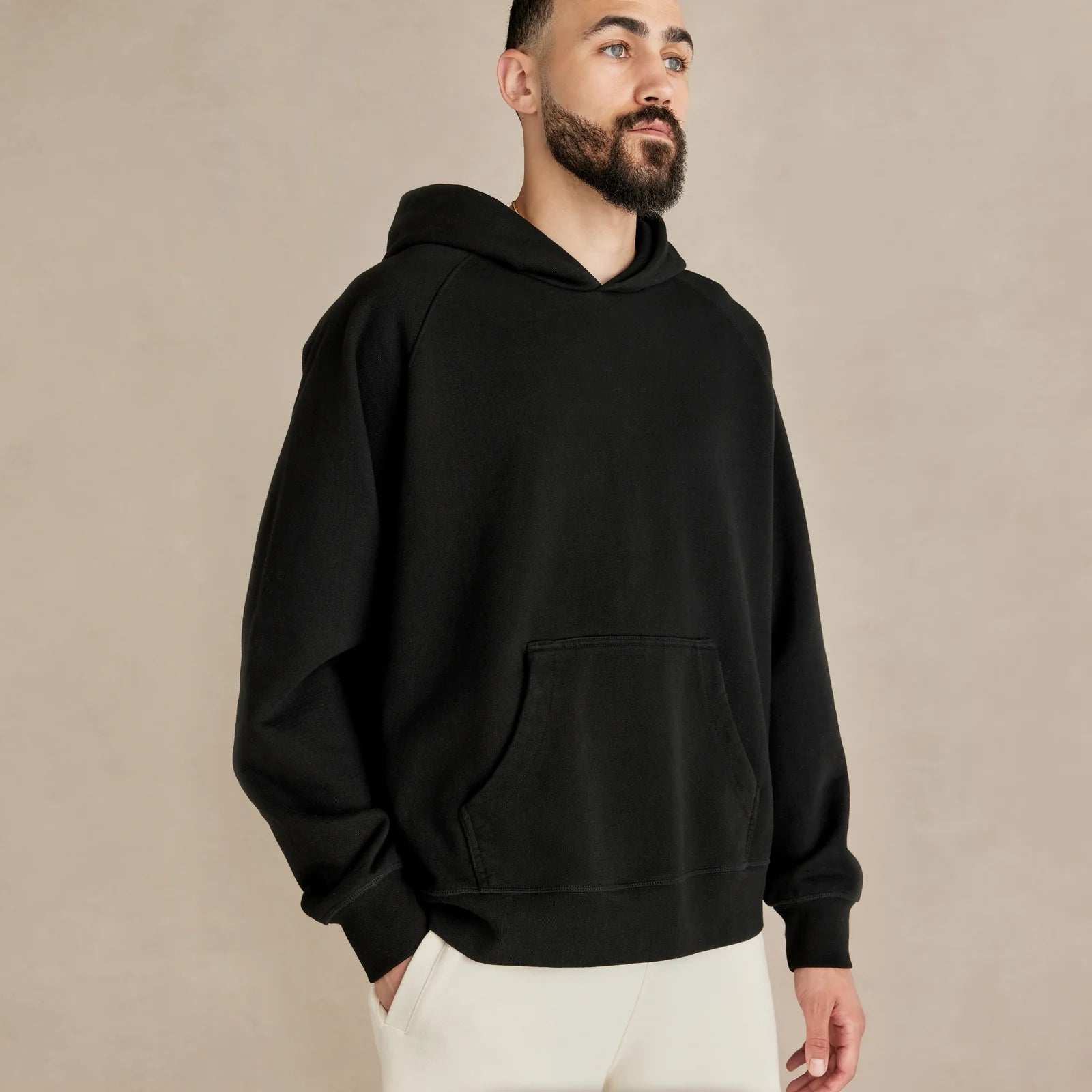 Unisex black oversized hoodie on model