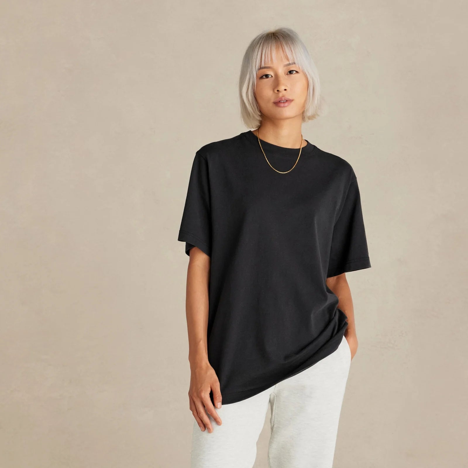 The Easy Fit Tee black t-shirt worn by female model front view