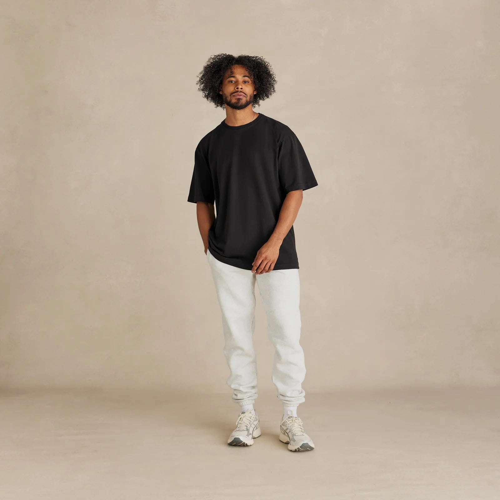 The Easy Fit Tee black t-shirt worn by male model front view