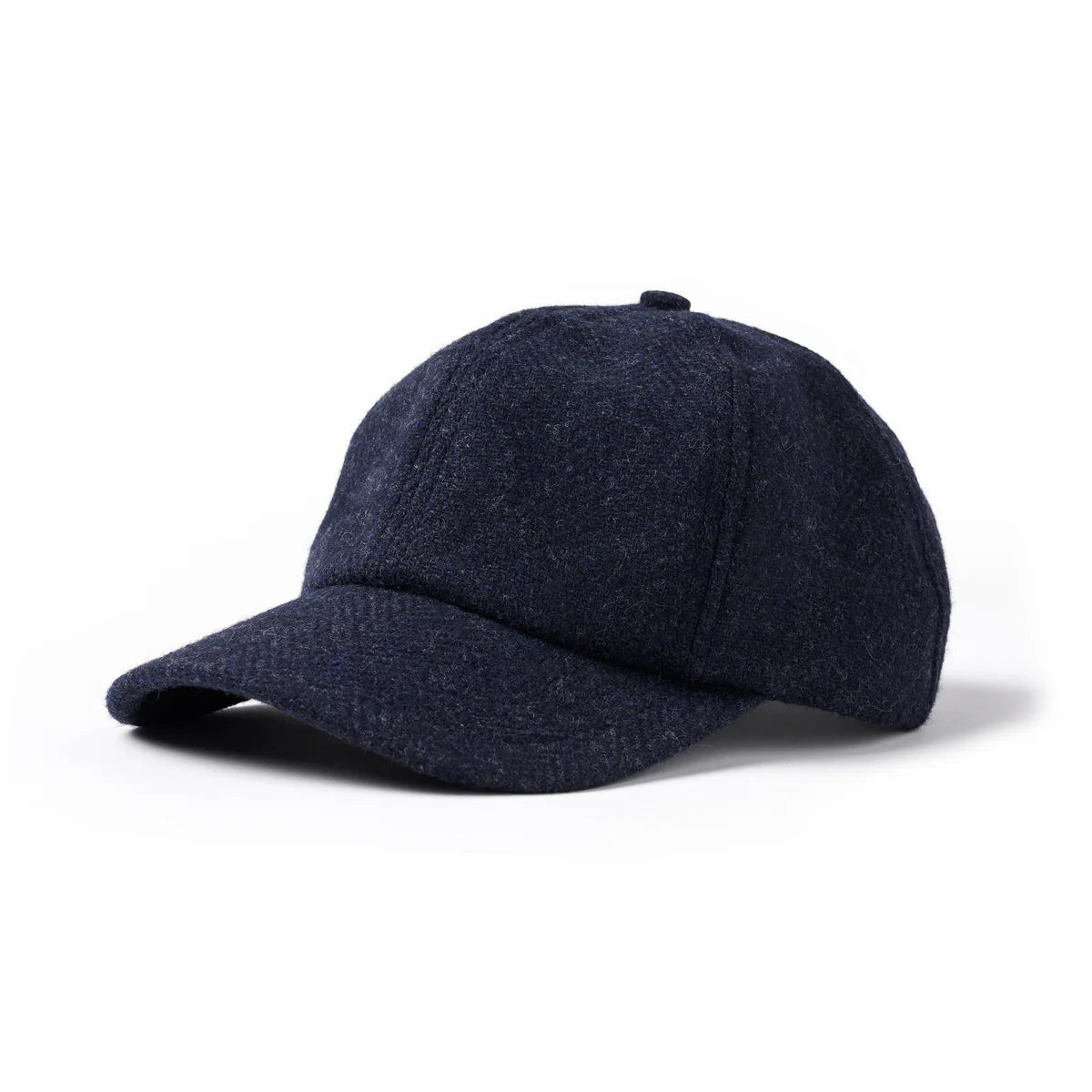 Navy wool 6-panel baseball cap with textured fabric and curved brim, close-up product view on white background