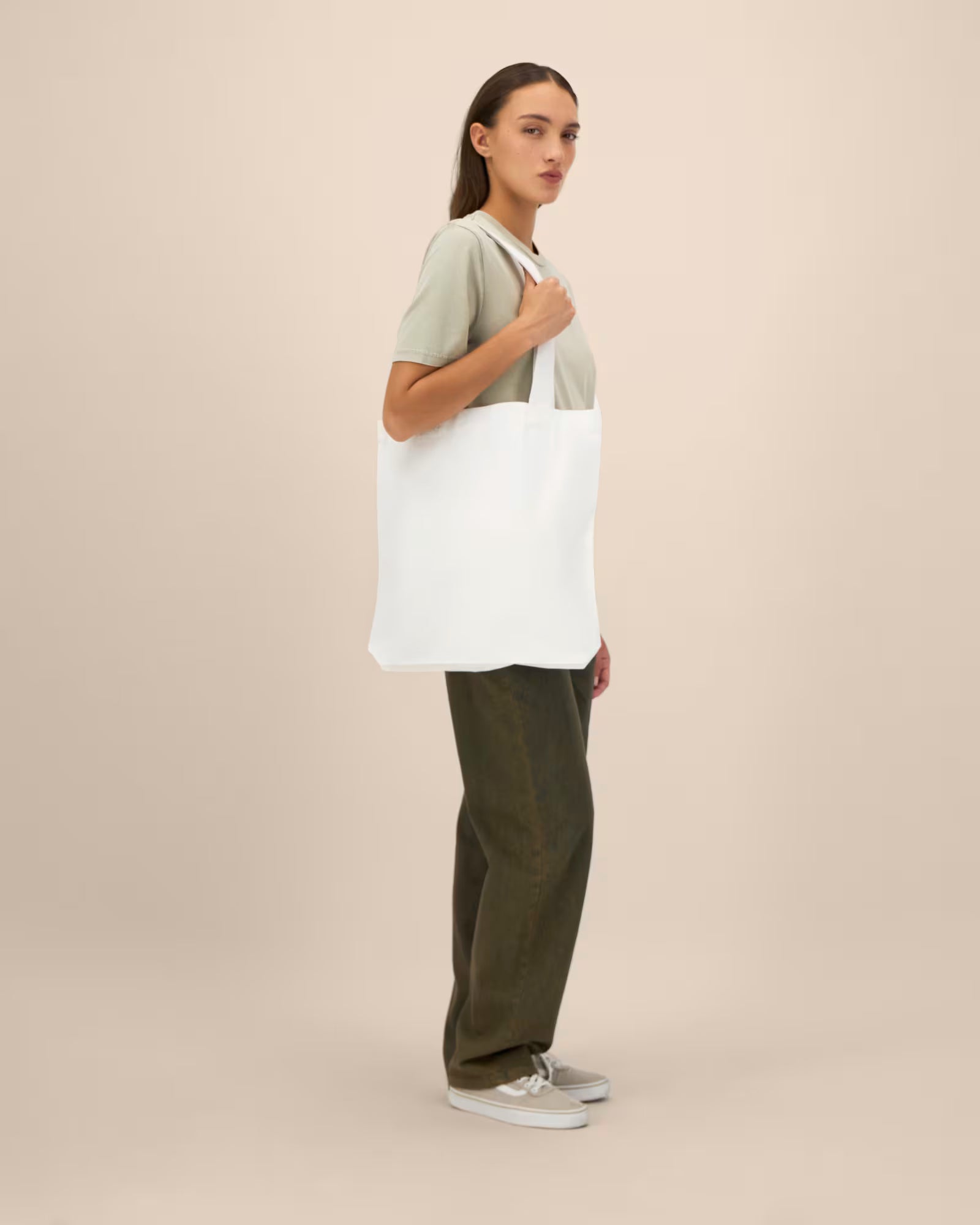 white unisex canvas tote bag on model