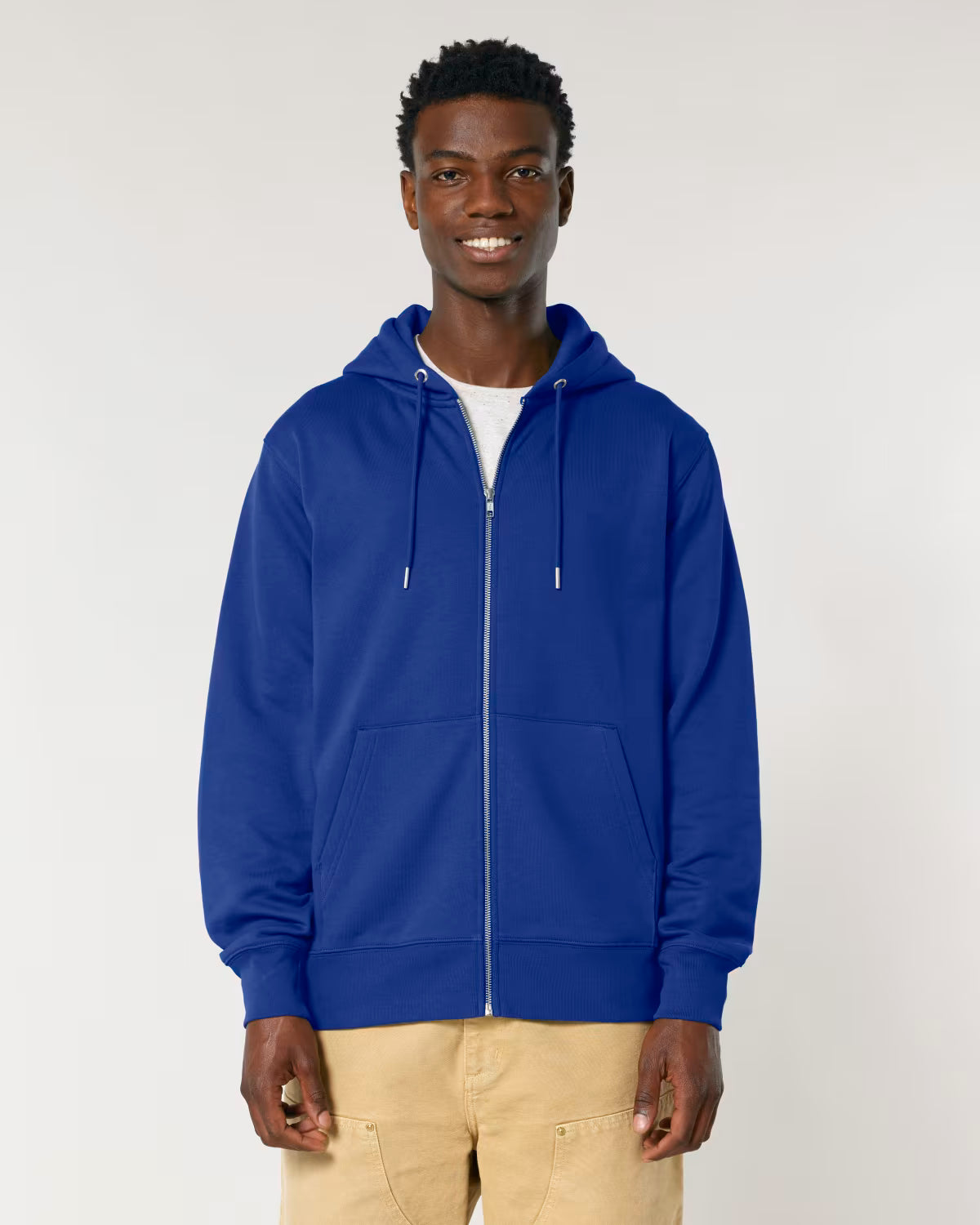 Man wearing a blue cotton hoodie on a white background