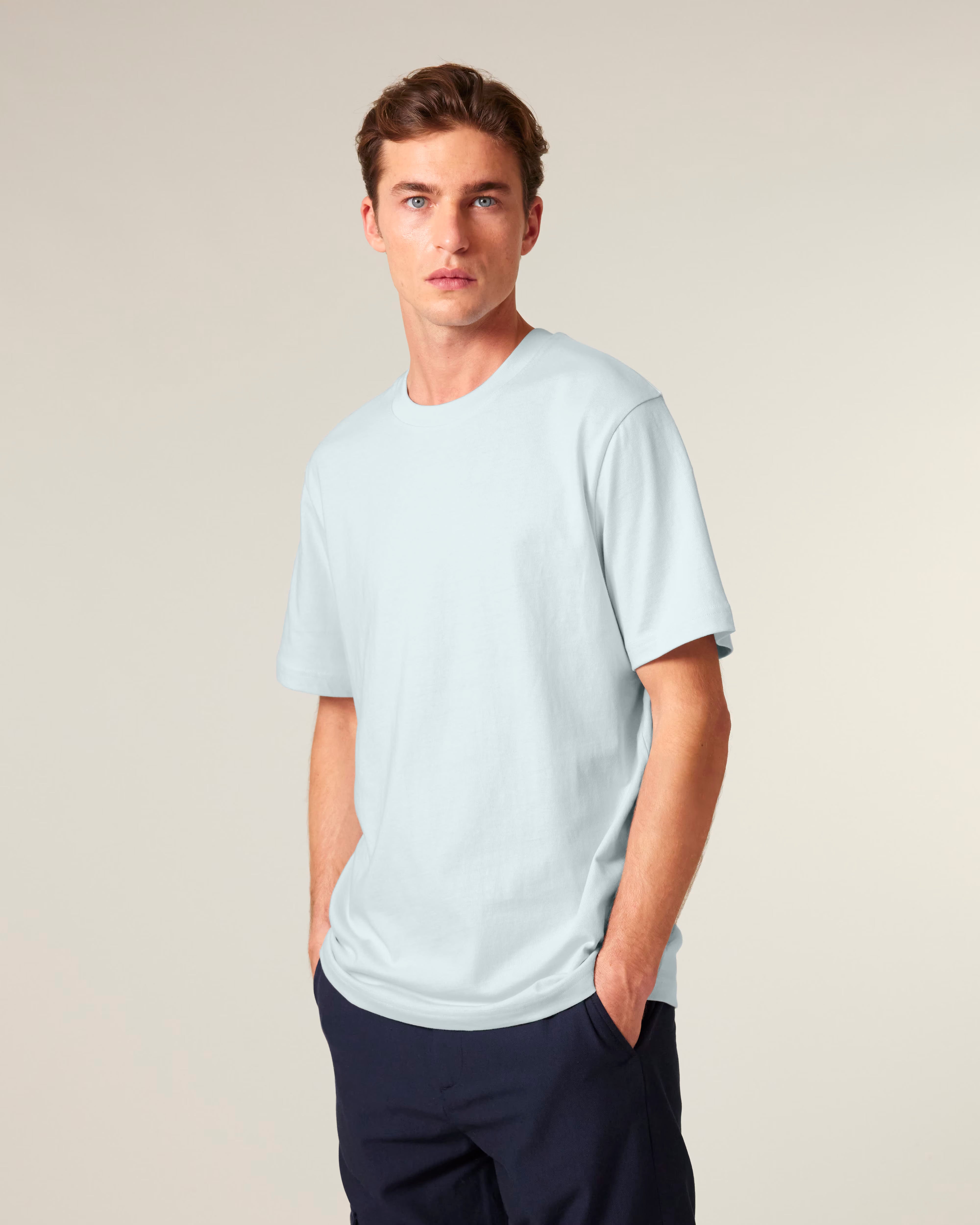 light sky blue unisex cotton t-shirt on male model, everyday sustainable essential