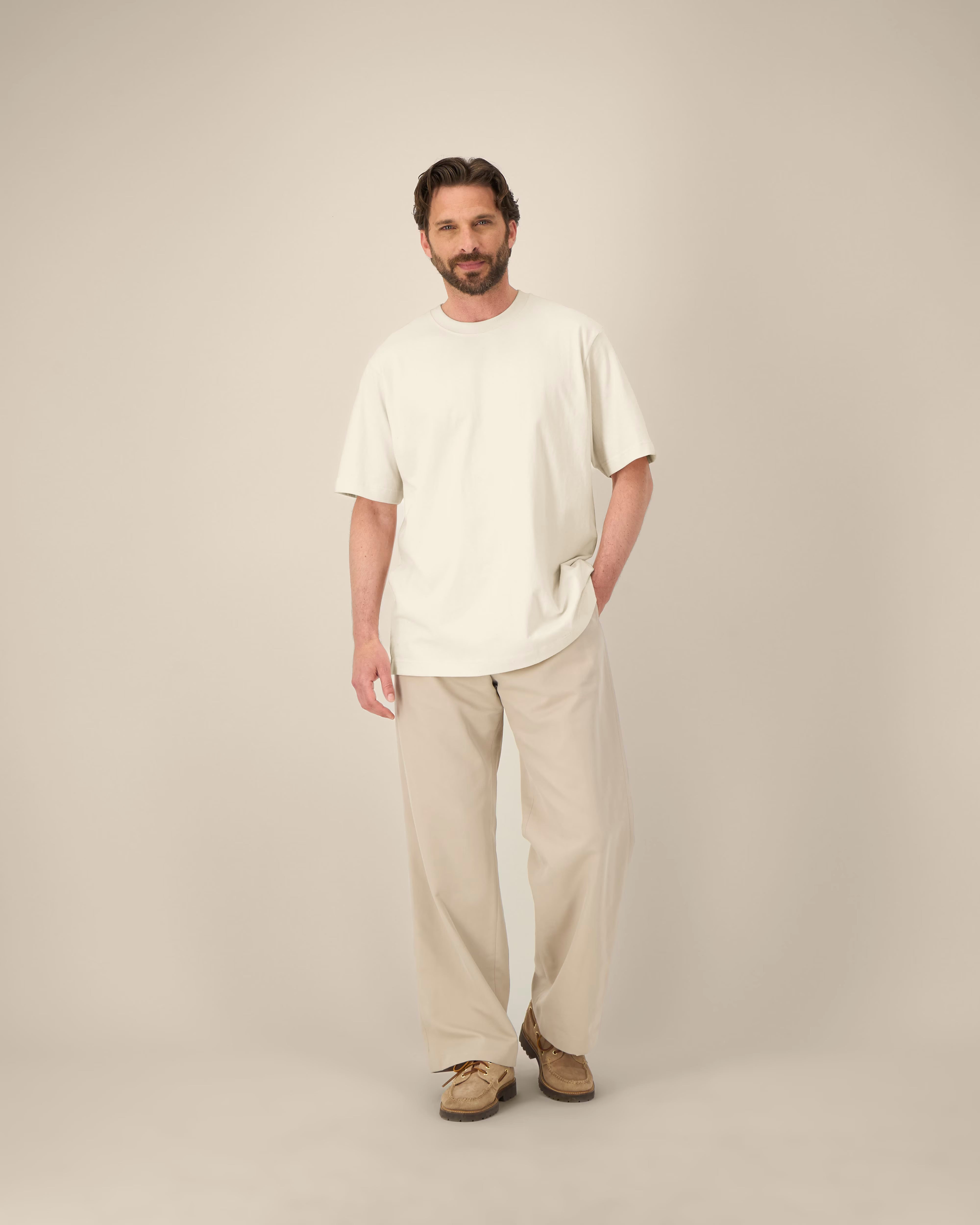 natural beige unisex cotton t-shirt on model, relaxed fit