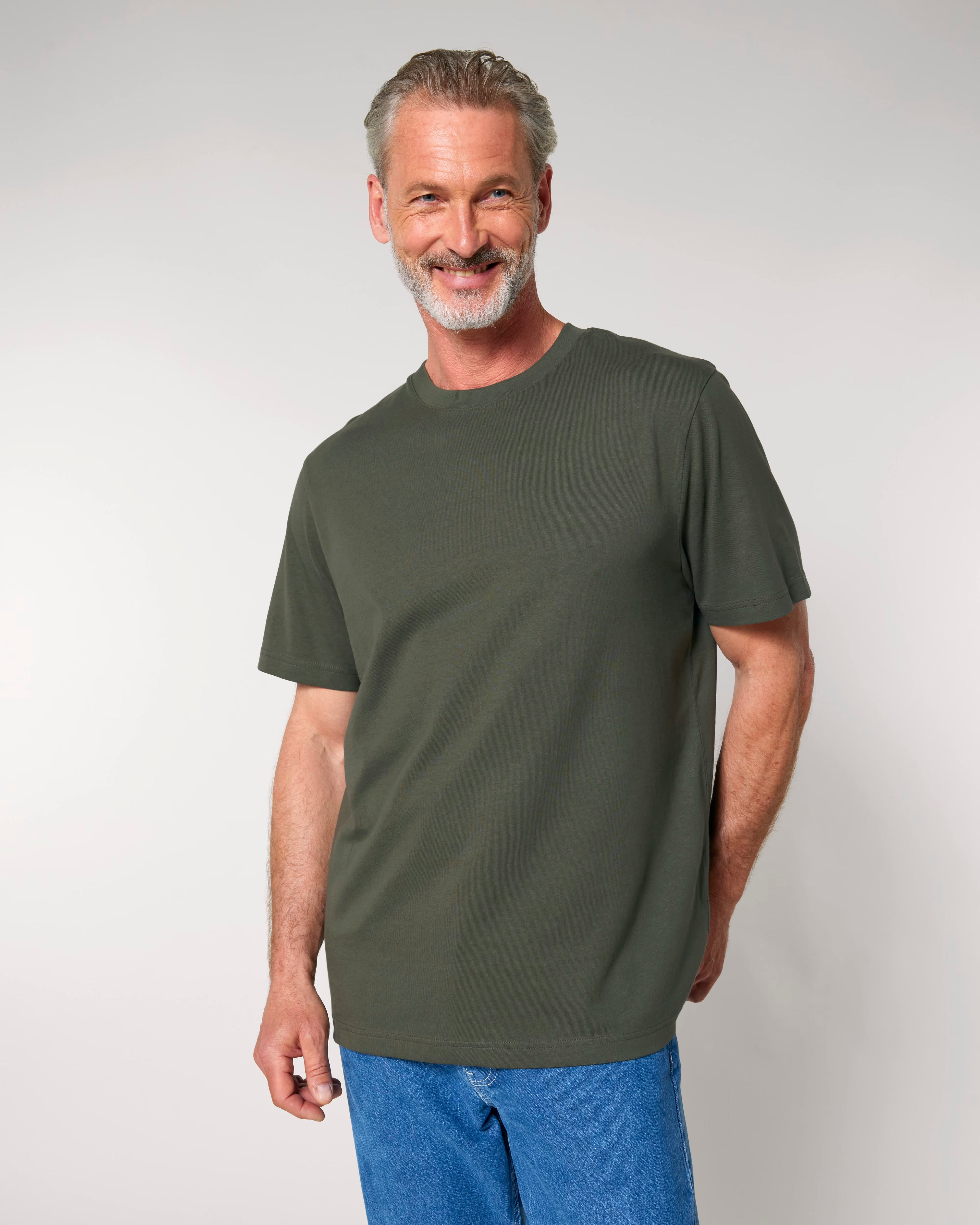 deep olive green unisex cotton t-shirt on female model, relaxed fit sustainable fashion