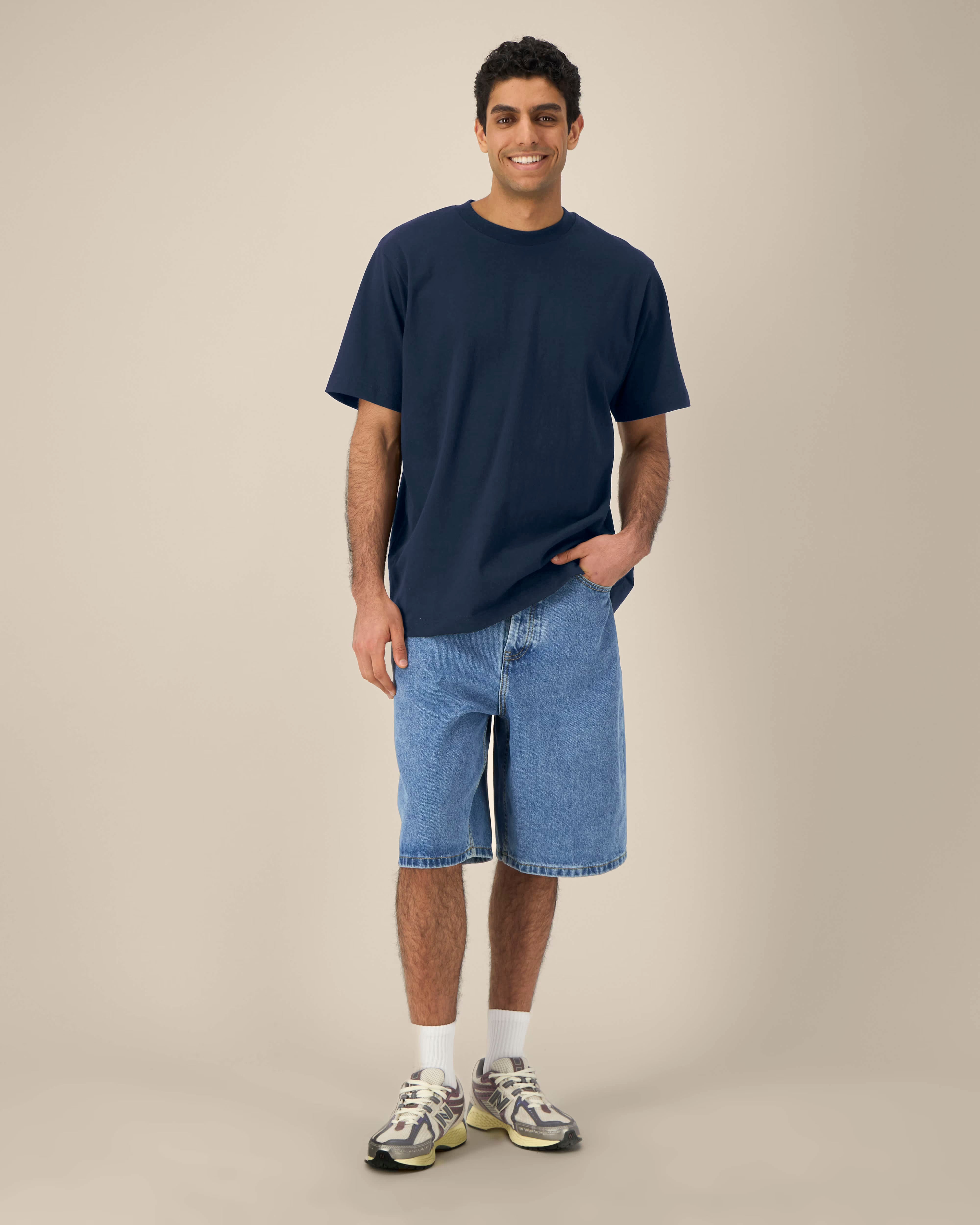 navy blue unisex cotton t-shirt on model, relaxed fit