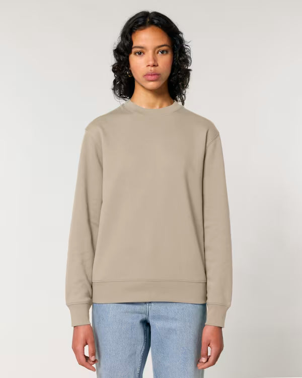 soft beige unisex crewneck sweatshirt on model, relaxed fit