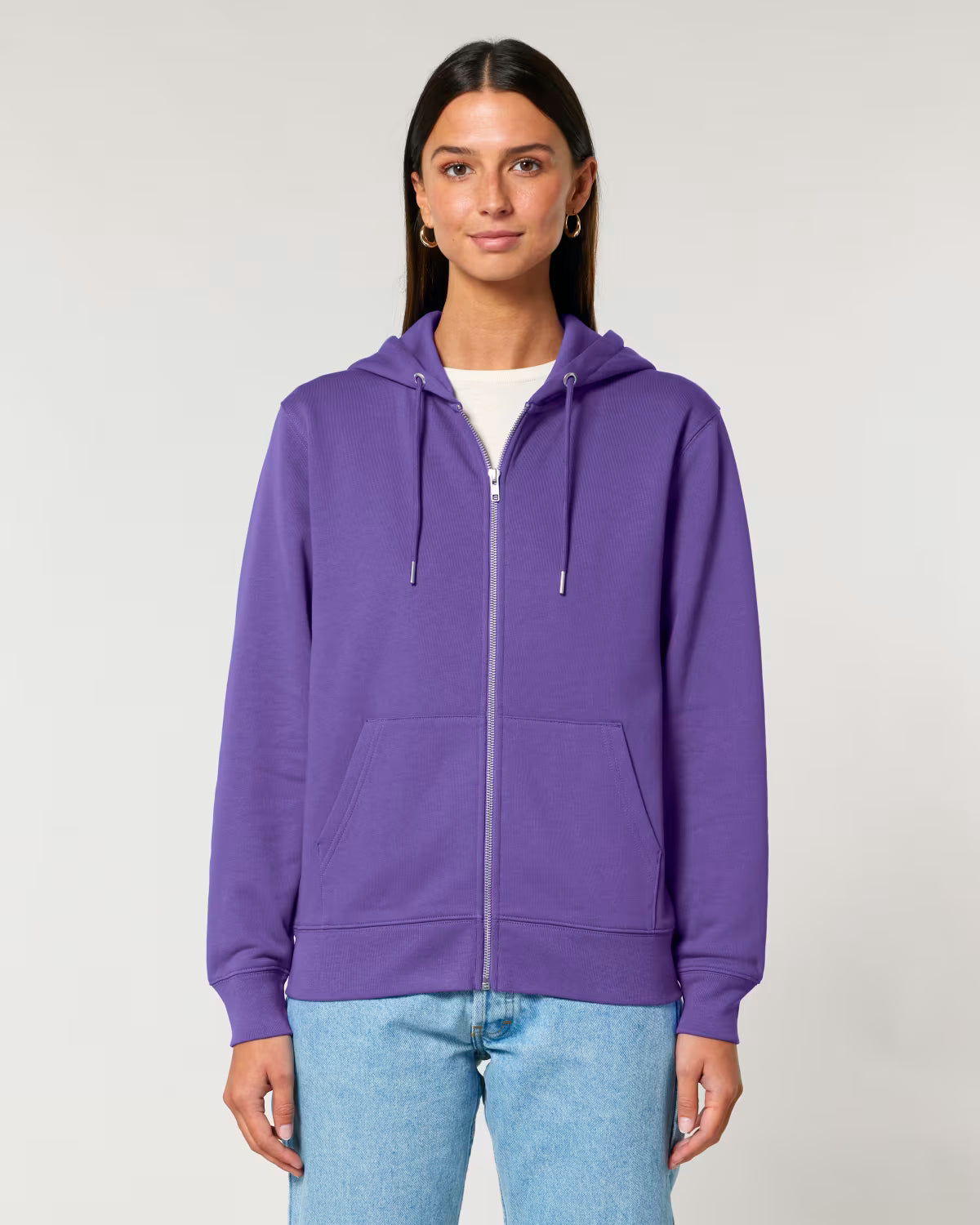 Person cotton wearing a purple hoodie on a plain background