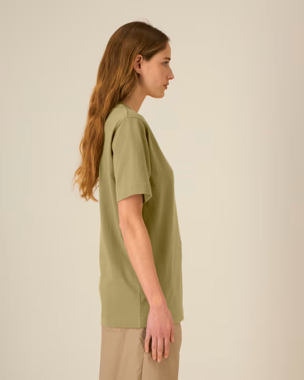 olive green unisex cotton t-shirt on model, side profile