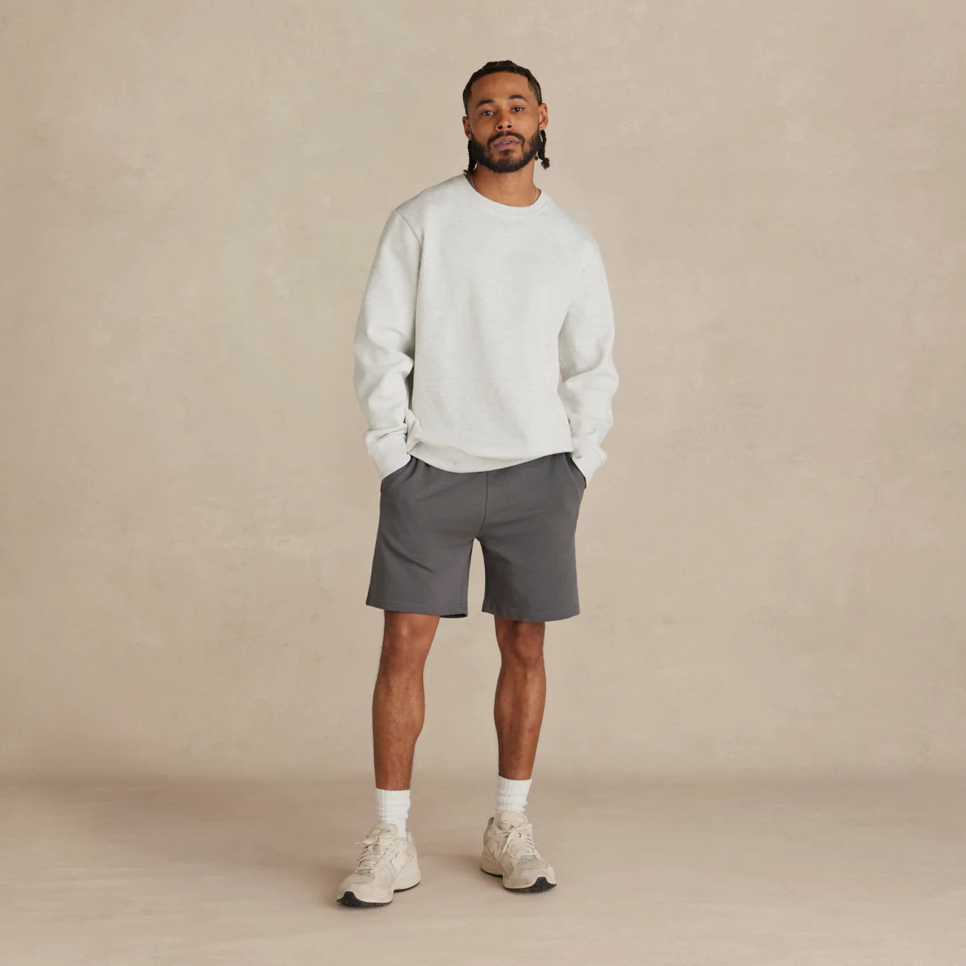 EMERCYN Essential Crewneck – light grey unisex sweatshirt styled in lifestyle look