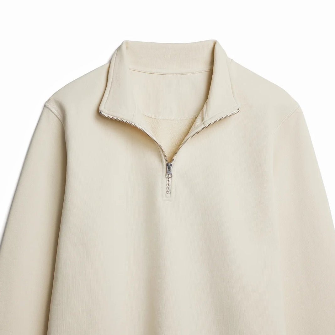 Beige fleece pullover with a zipper