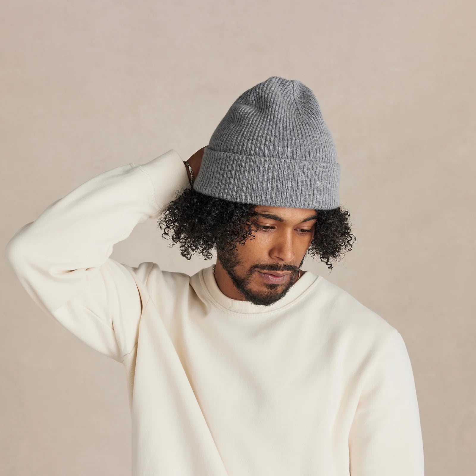 The Sunday Layer grey beanie worn on model unisex fit