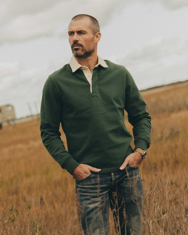 White collar detail on green men’s rugby shirt