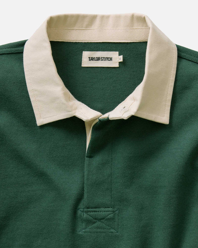 Green cotton rugby shirt fabric texture close up