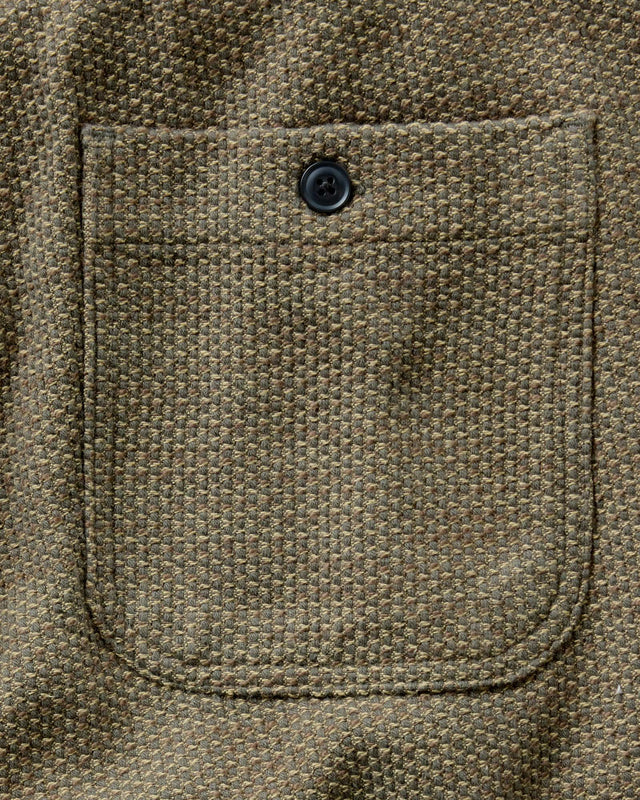 Olive green men’s jogger pants back pocket detail
