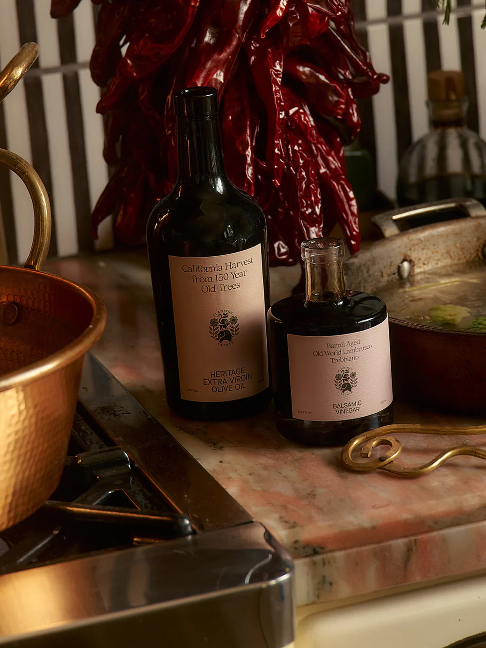 Flamingo Estate premium olive oil in kitchen setting, artisanal gourmet food branding