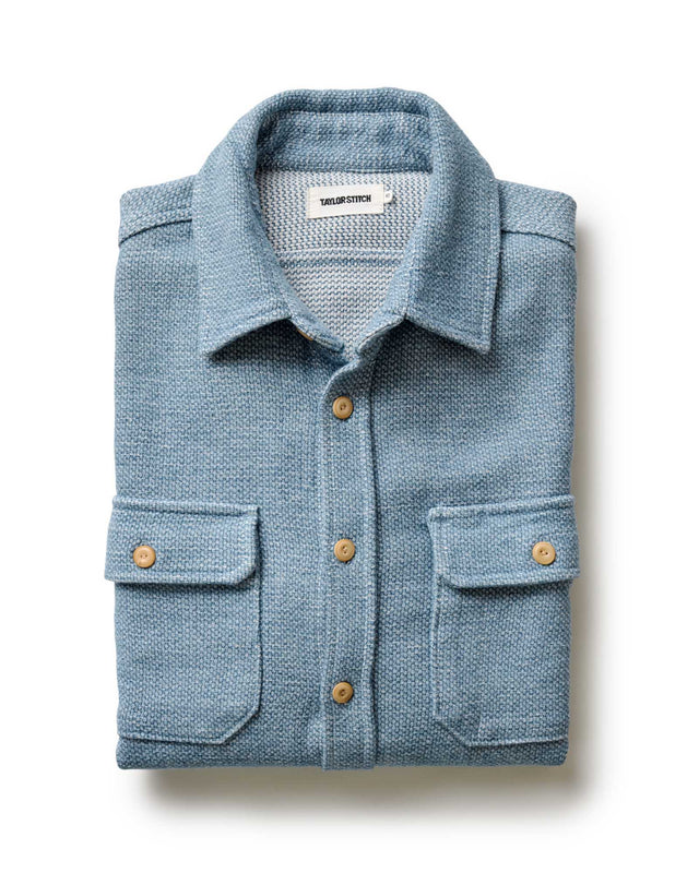 Indigo blue men’s work shirt with chest pockets folded view