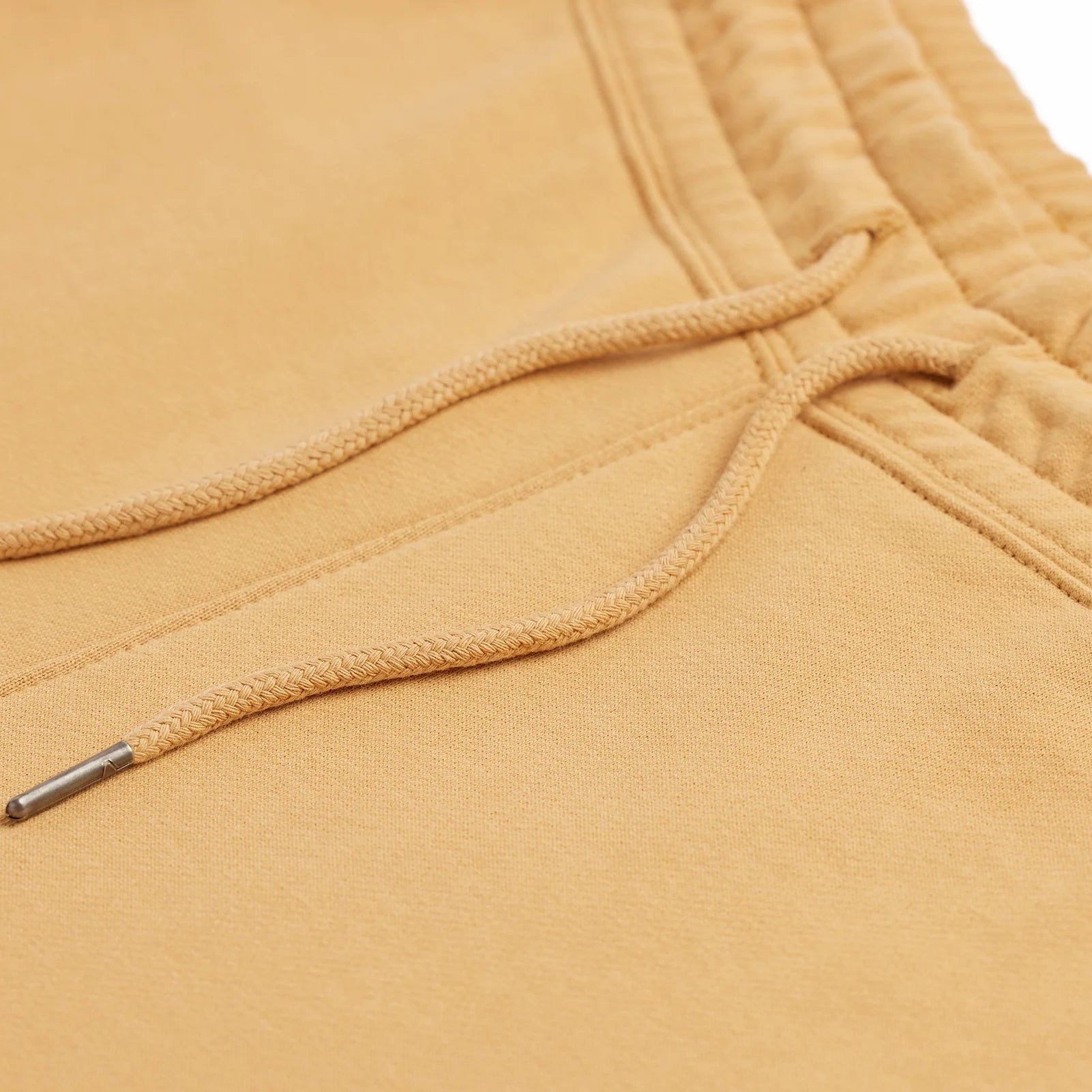 The Essential Jogger butter sweatpants fabric detail close-up