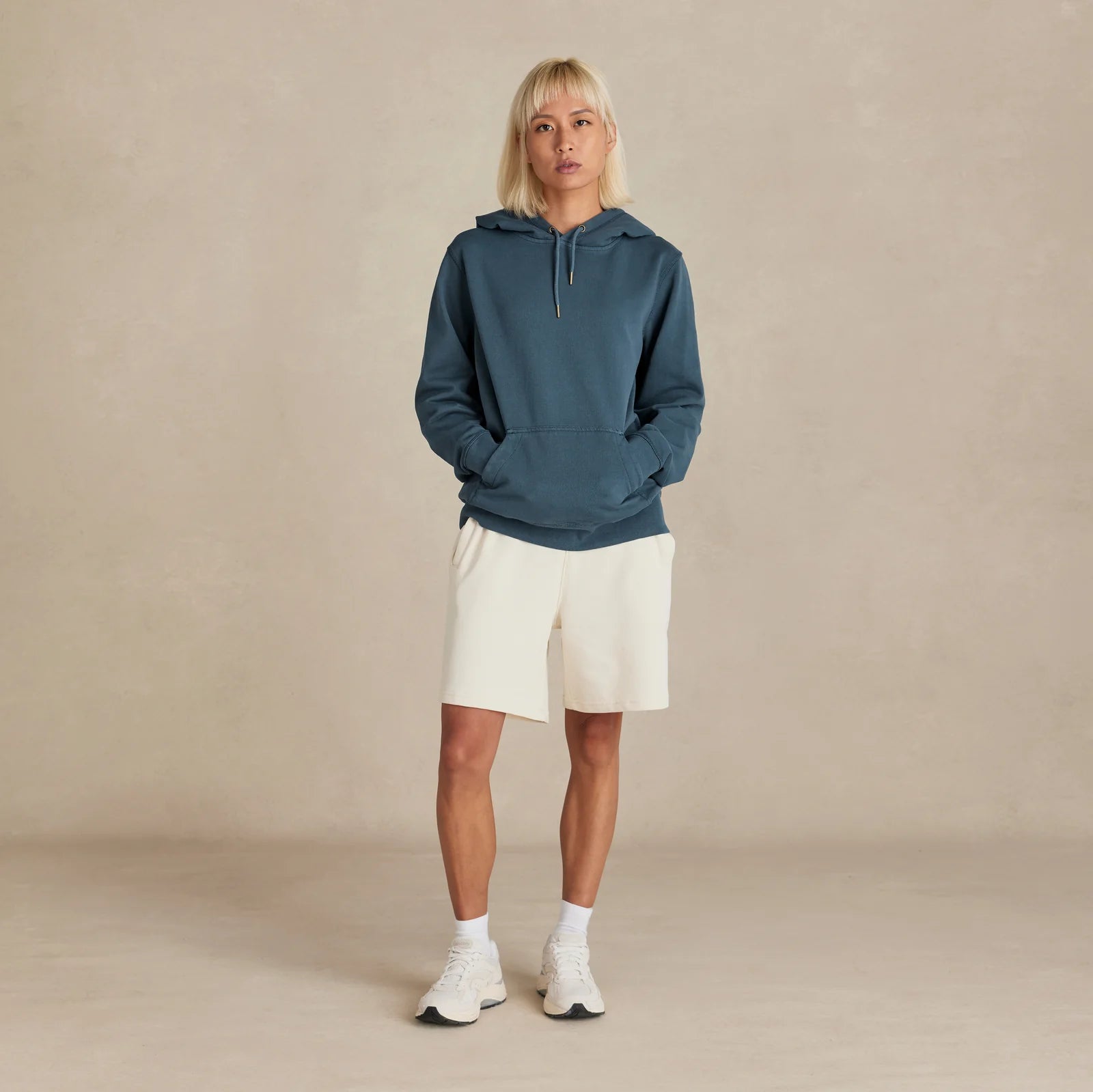 The Classic Hoodie deep teal hoodie worn by male model

