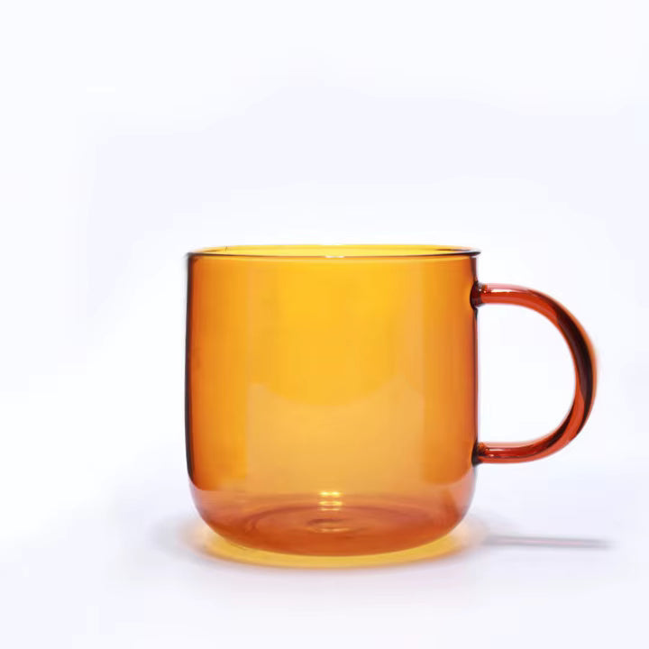 amber glass mug close-up, colored transparent mug for logo customization