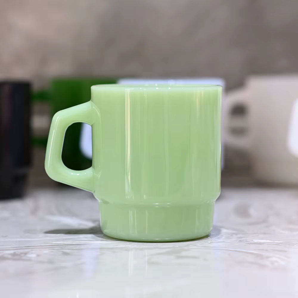 green ceramic mug close-up lifestyle photo, custom logo print promotional merchandise