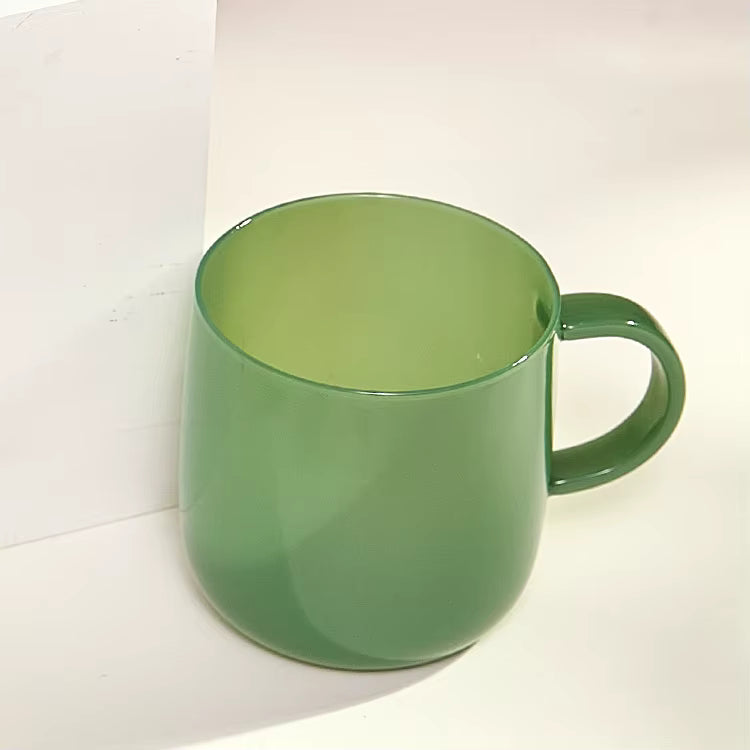 green glass mug close-up, colored transparent mug for custom logo customization