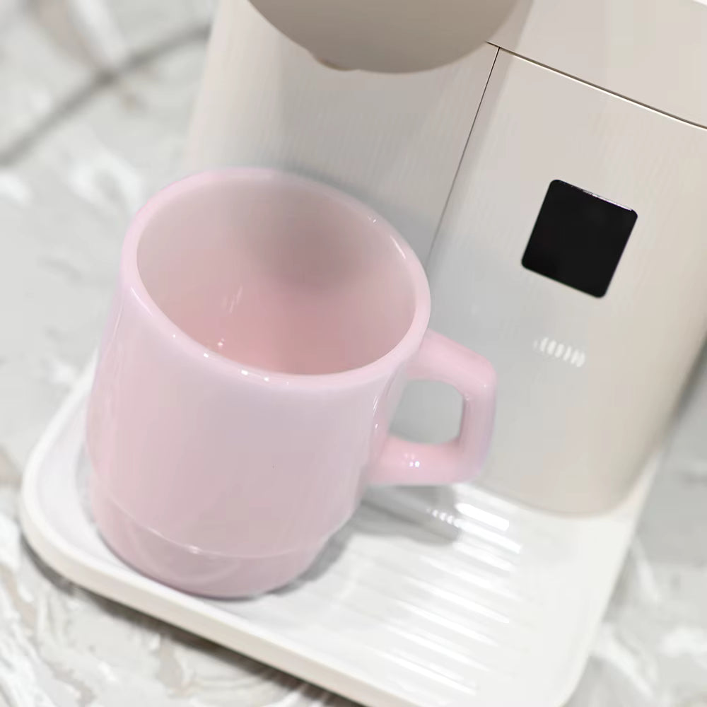 pink ceramic mug with custom logo area, eco-friendly branded merchandise
