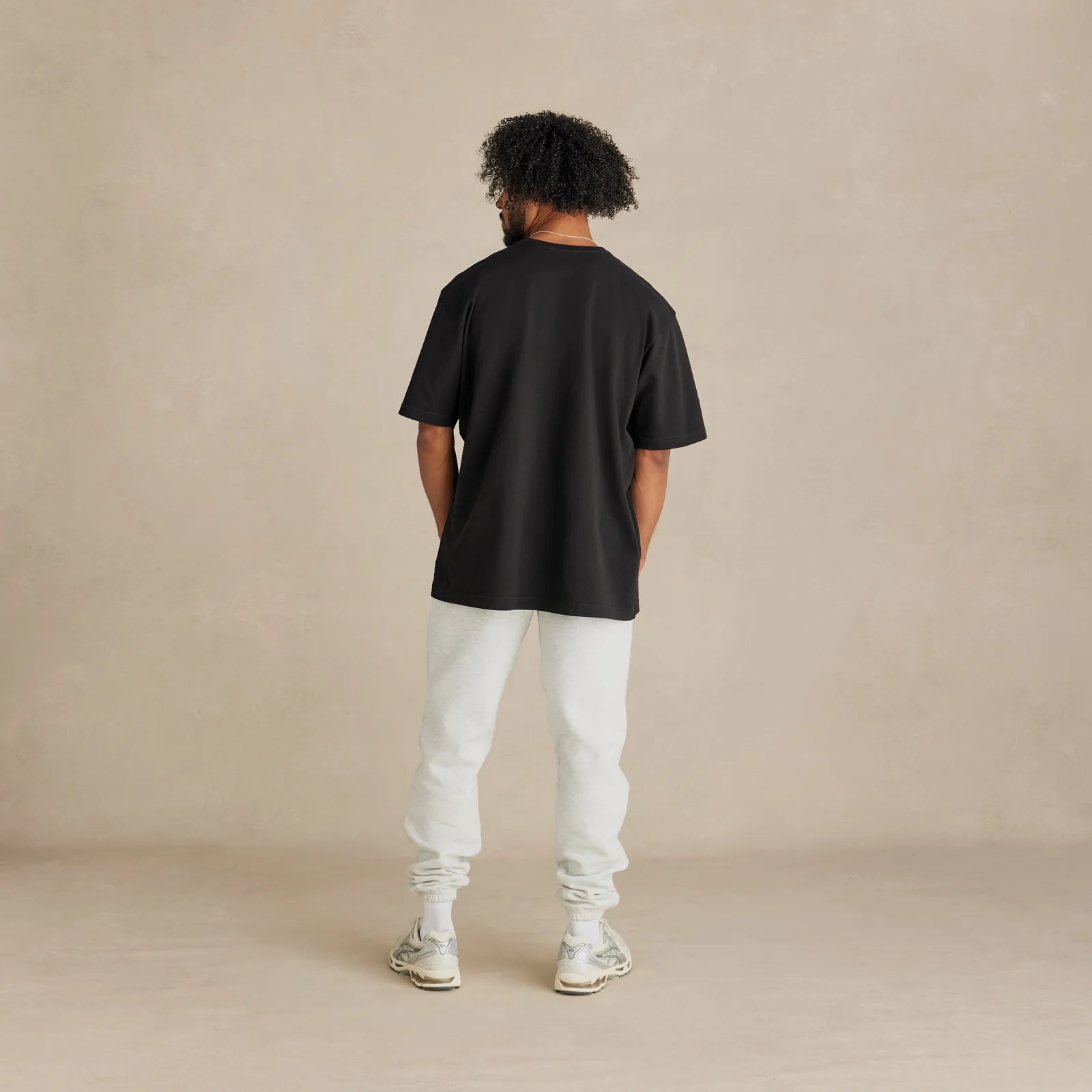 The Easy Fit Tee black t-shirt worn by male model back view