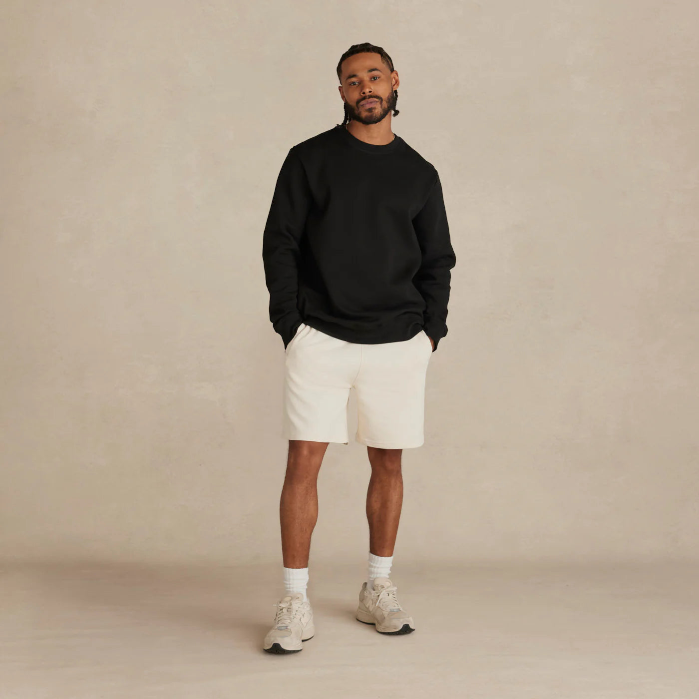 EMERCYN Essential Crewneck – slate  Black unisex premium cotton sweatshirt worn by model
