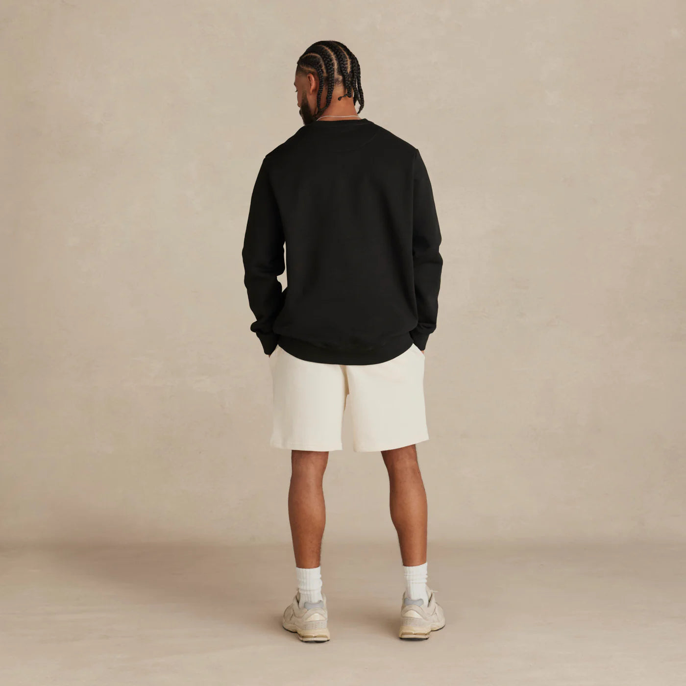 EMERCYN Essential Crewneck – slate  Black unisex premium cotton sweatshirt worn by model