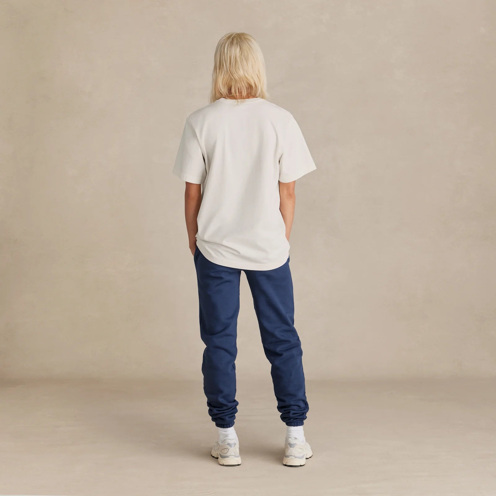 The Easy Fit Tee off white t-shirt worn by female model back view