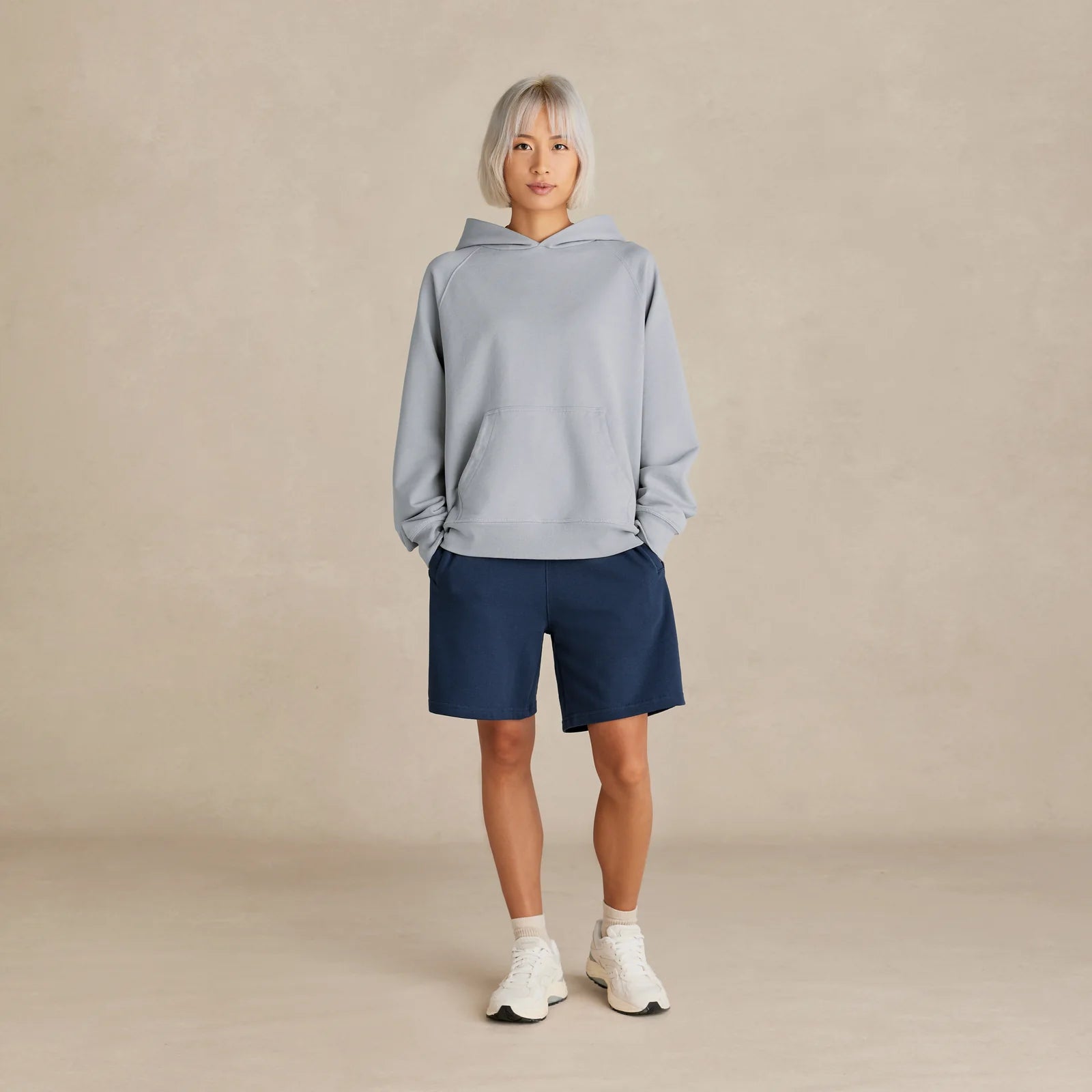 Unisex light grey oversized hoodie on model