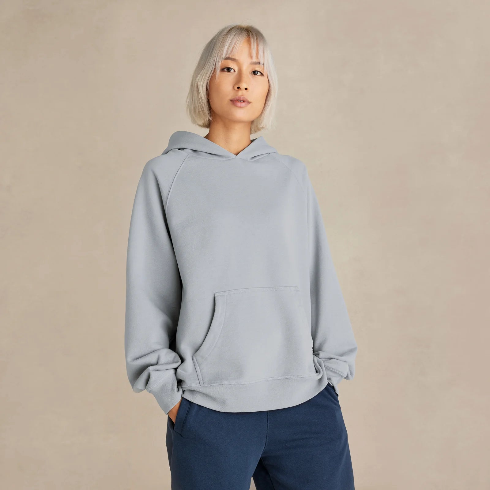 Unisex light grey oversized hoodie on model