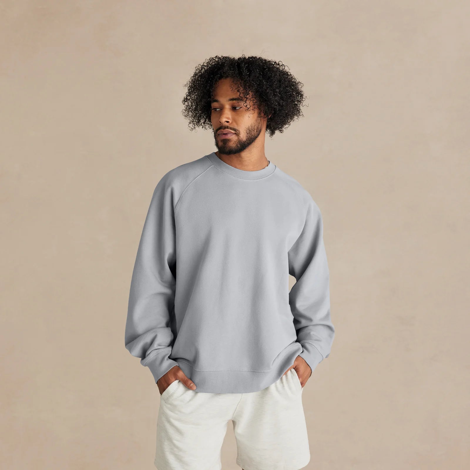 Unisex light blue oversized The Relaxed Crewneck on model