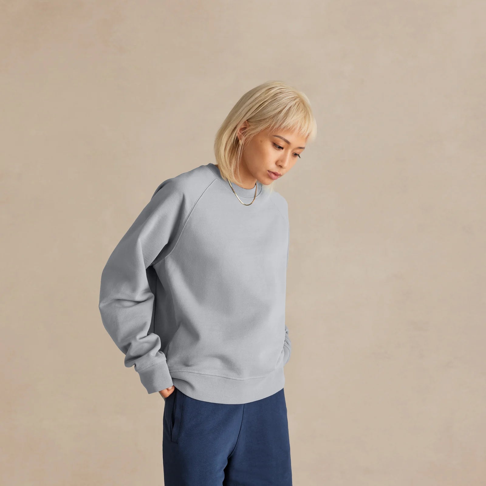 Unisex light blue oversized The Relaxed Crewneck on model