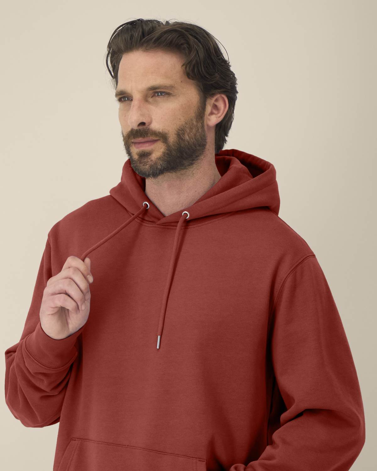 The Ashford Hoodie red hoodie worn by male model front view