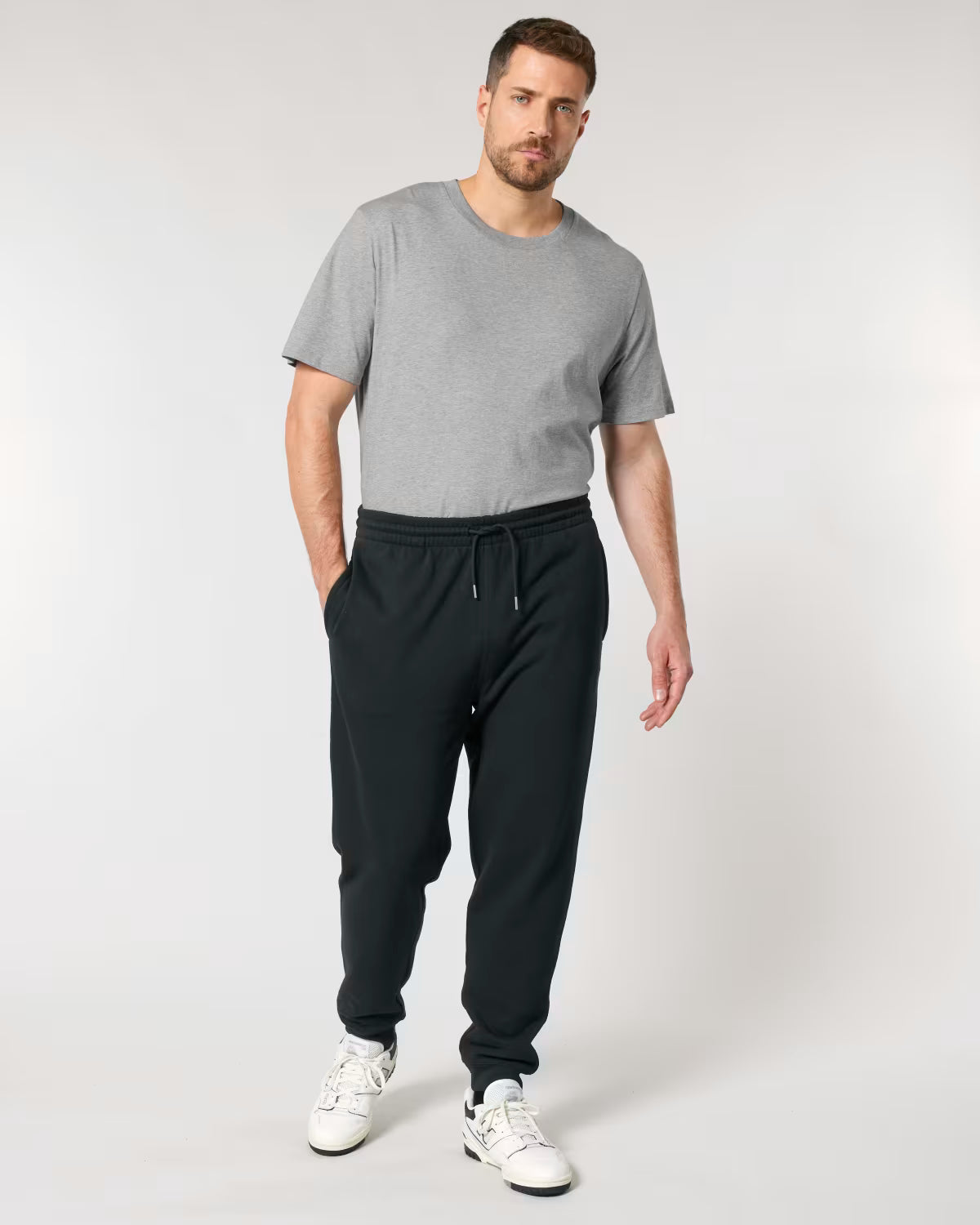 men’s green dark green jogger pants front view, sustainable cotton branded 