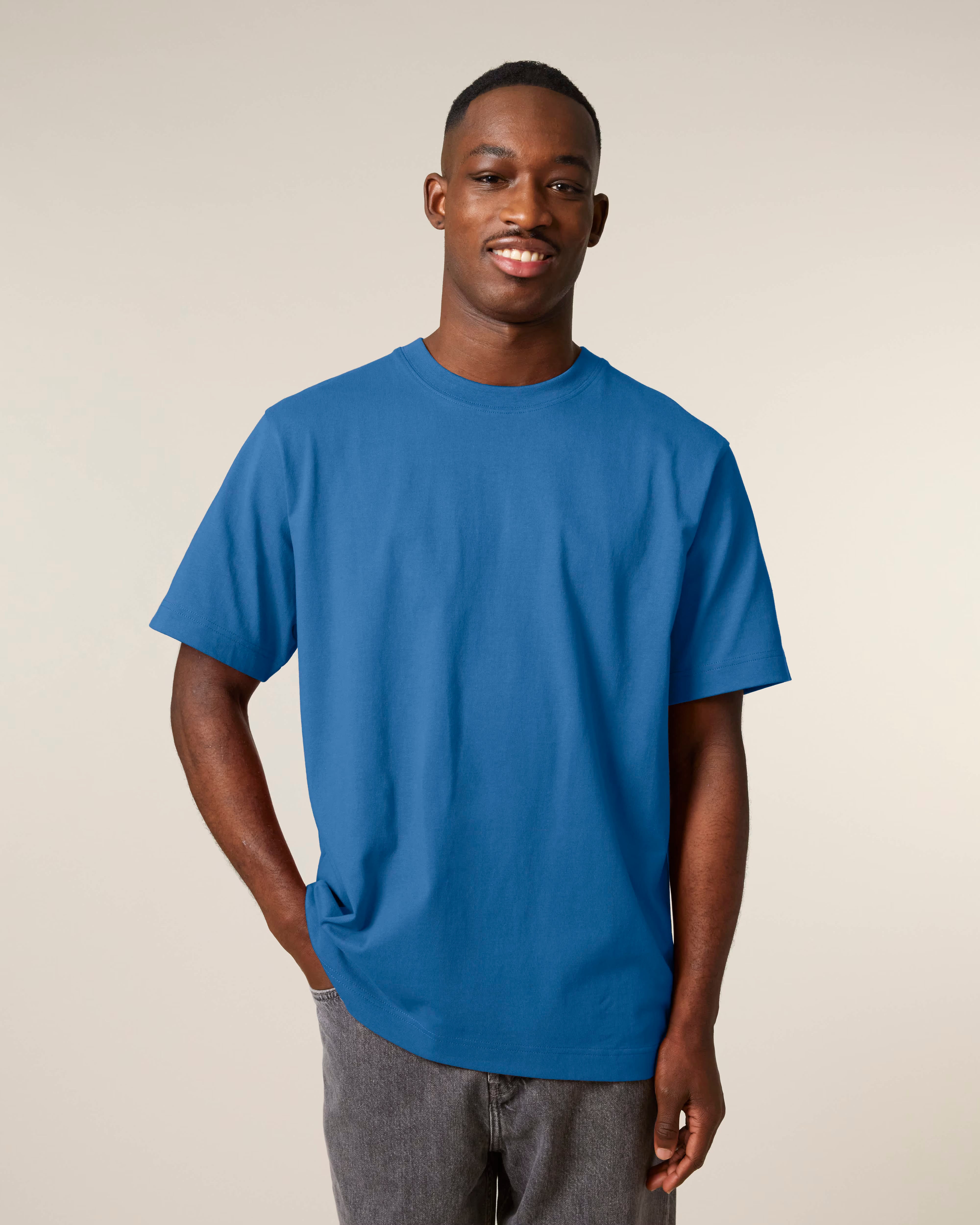bright blue unisex cotton t-shirt on model, relaxed fit