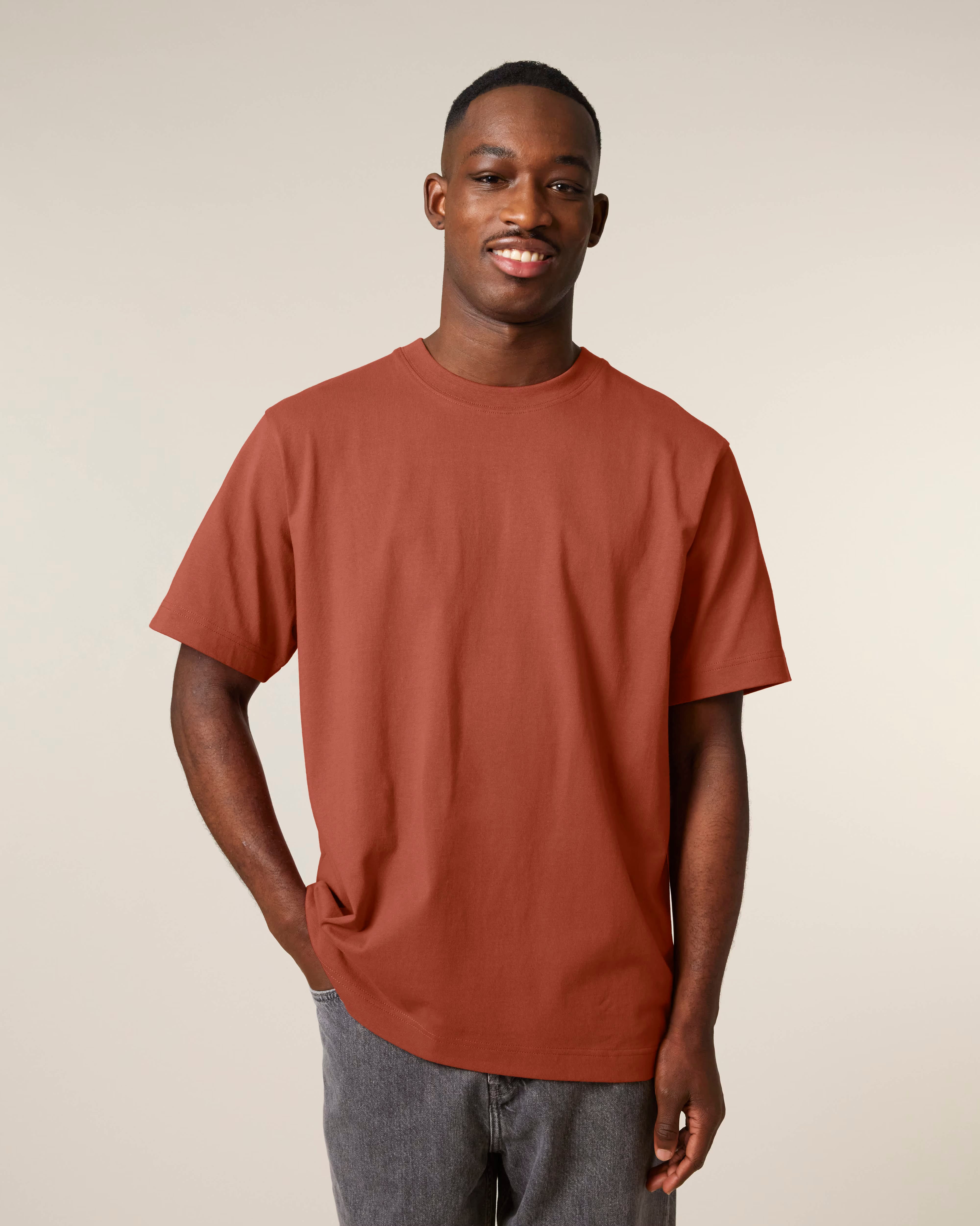rust red unisex cotton t-shirt on model, relaxed fit
