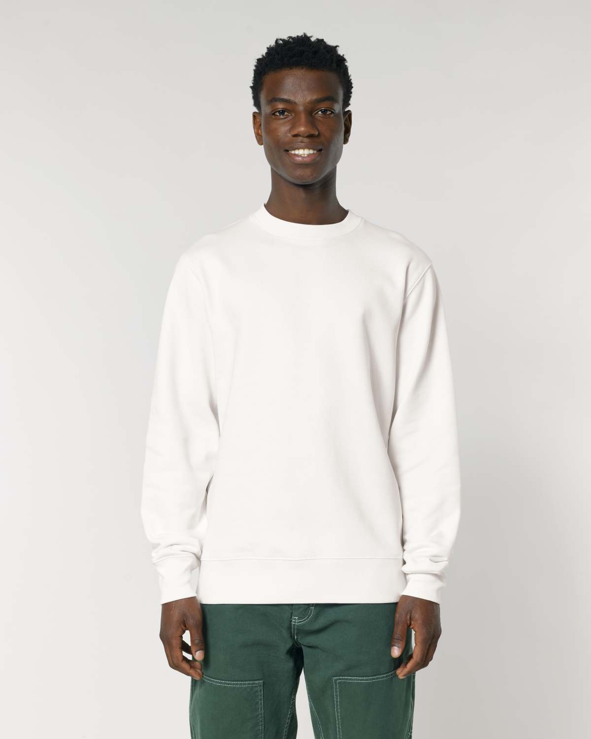 Man wearing a white unisex cotton hoodie isolated on white background