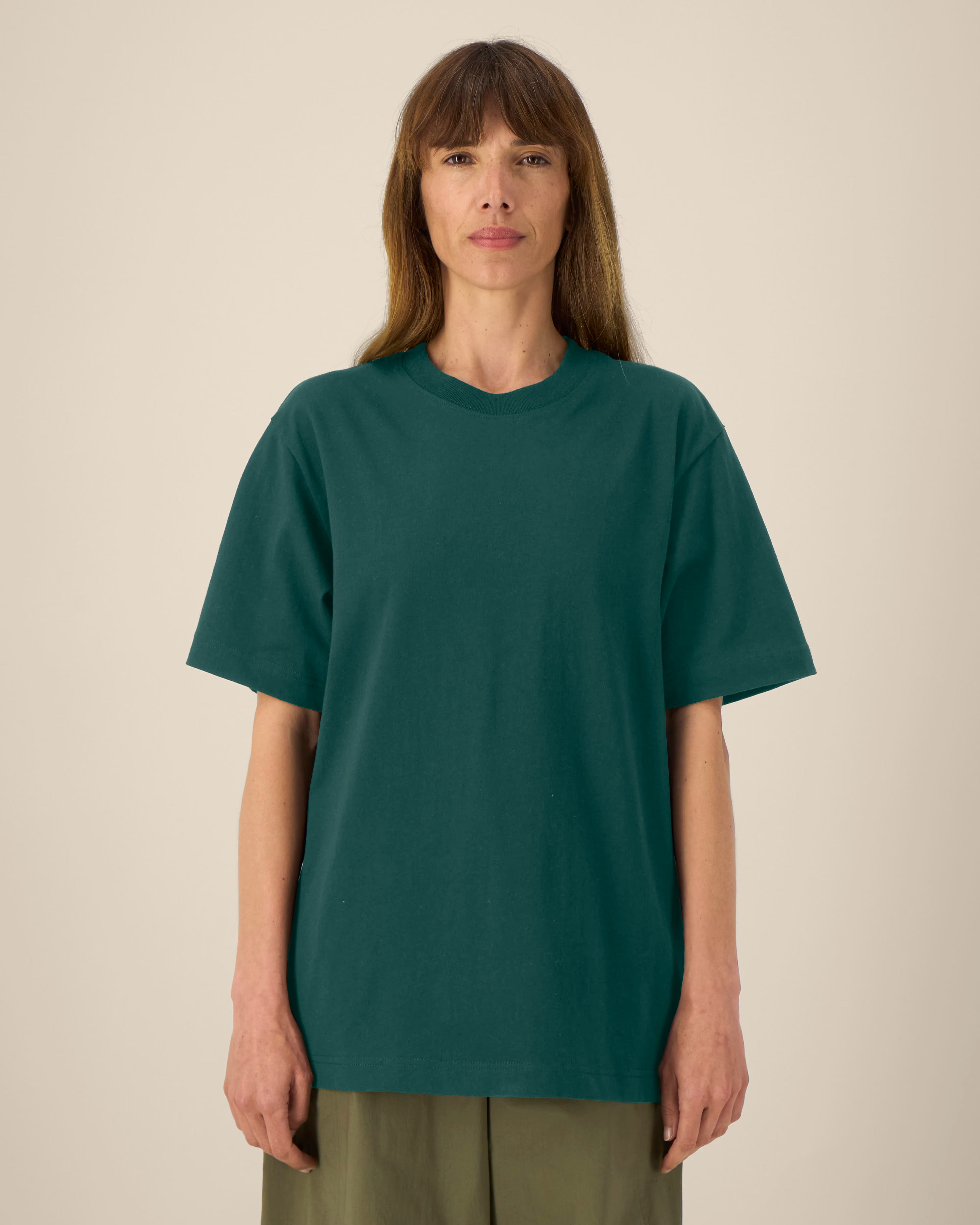 deep forest green unisex cotton t-shirt on model, relaxed fit
