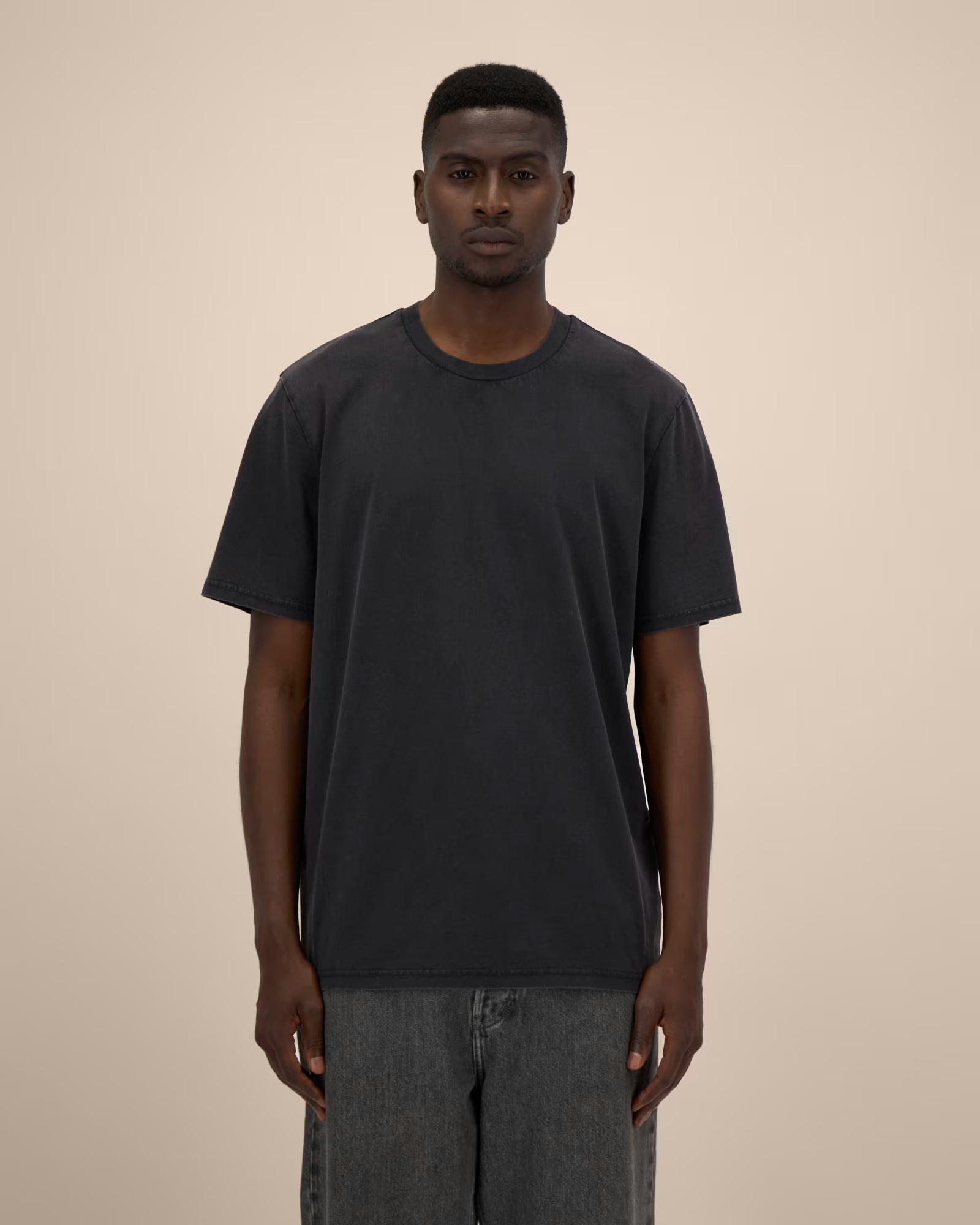 black unisex cotton t-shirt on model