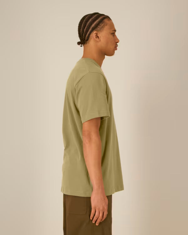 olive green unisex cotton t-shirt on model, side view