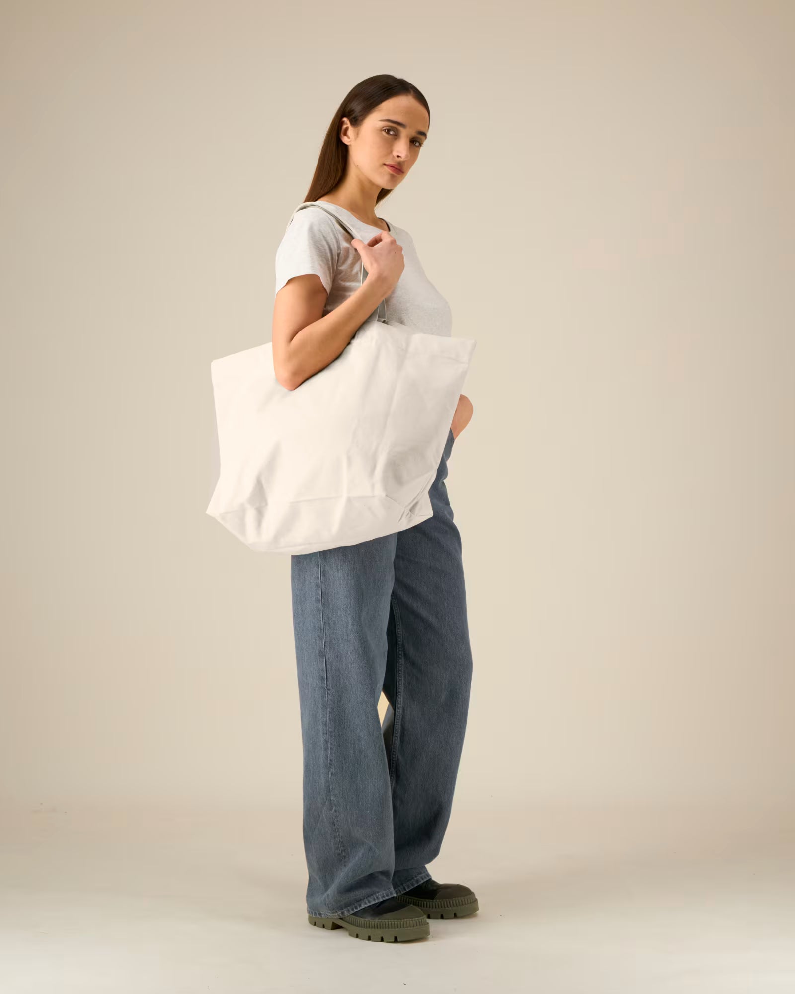 natural beige structured canvas tote bag on model
