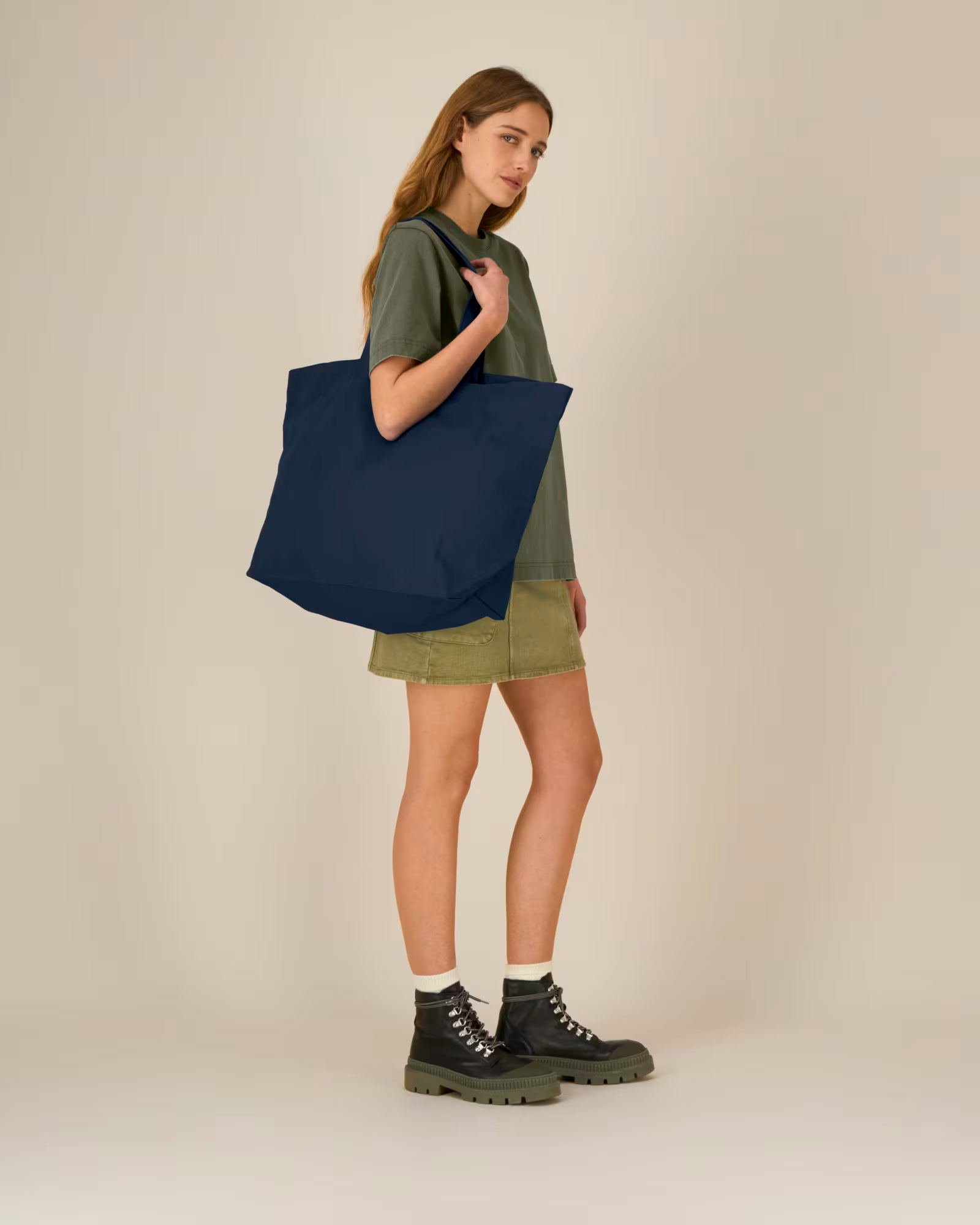 navy blue structured canvas tote bag on model