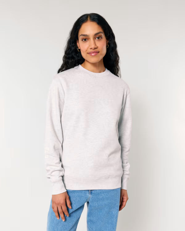 warm ivory unisex crewneck sweatshirt on model, relaxed fit