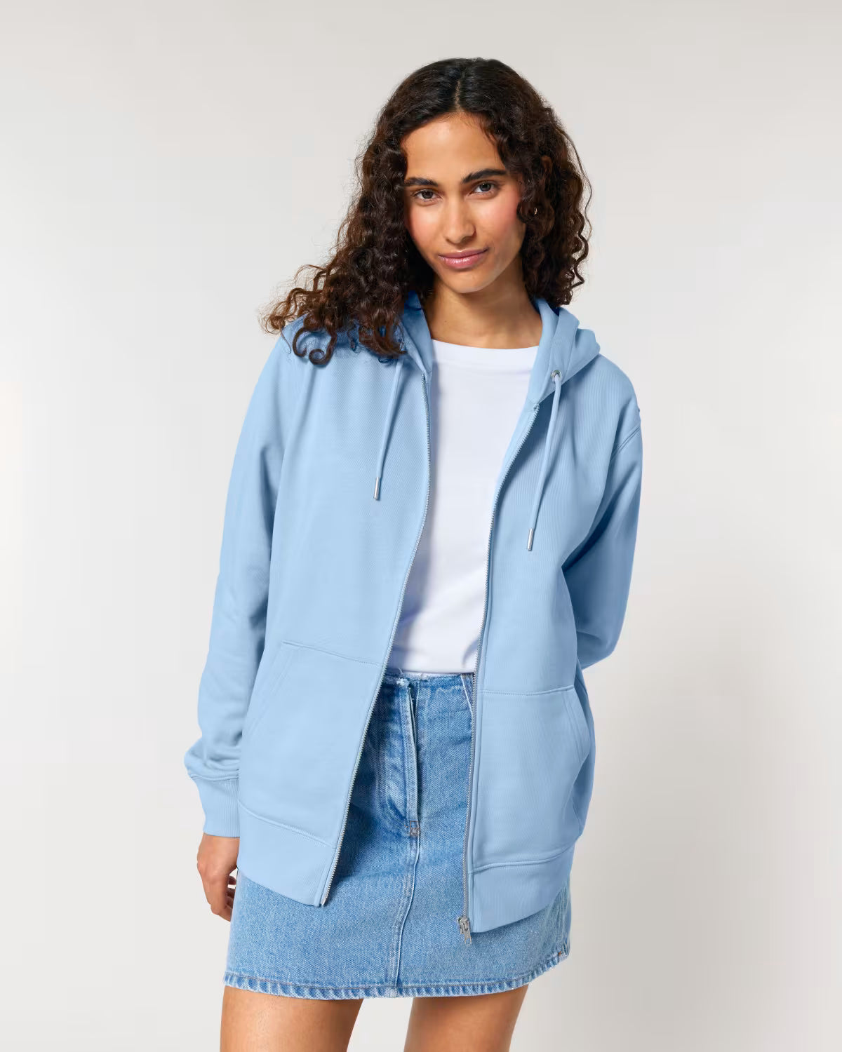 Woman wearing a light blue hoodie and denim skirt blank  for printing